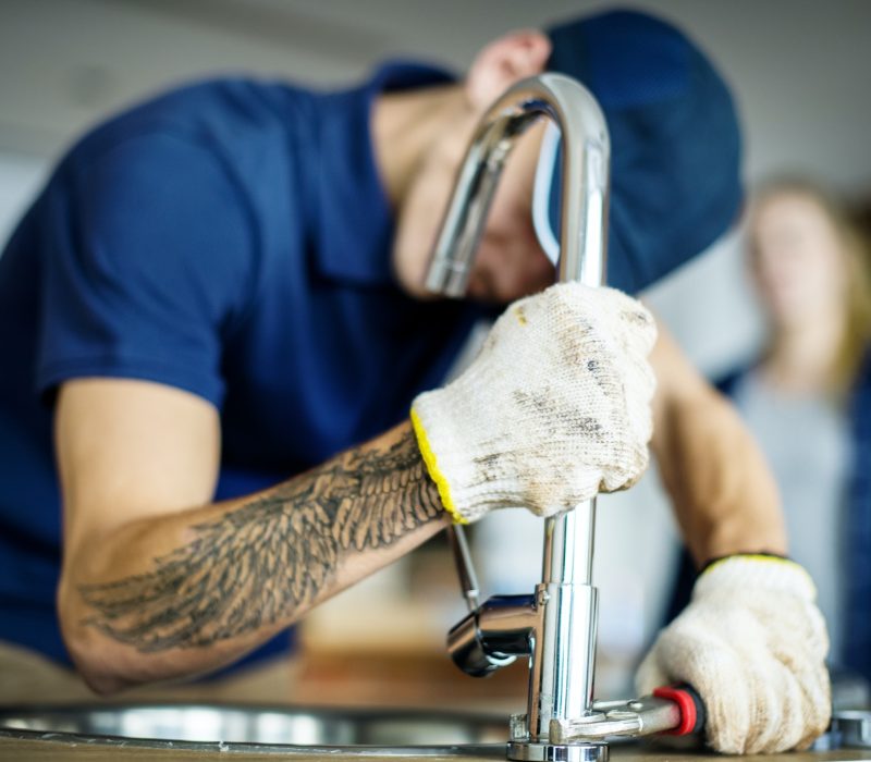 plumber-fixing-kitchen-sink.jpg